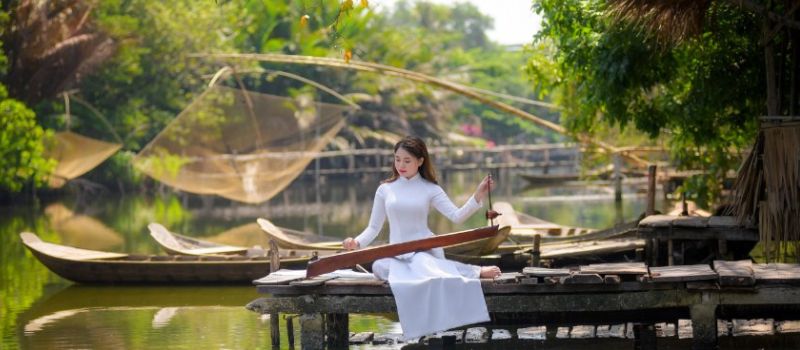 Partez en voyage au Vietnam pour essayer Ao Dai traditionnel vietnamien